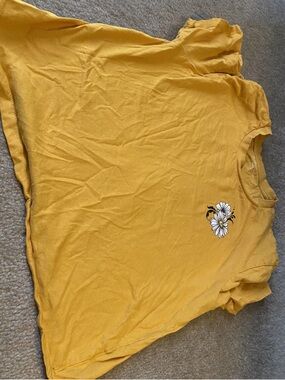 rebellious one size large yellow shirt